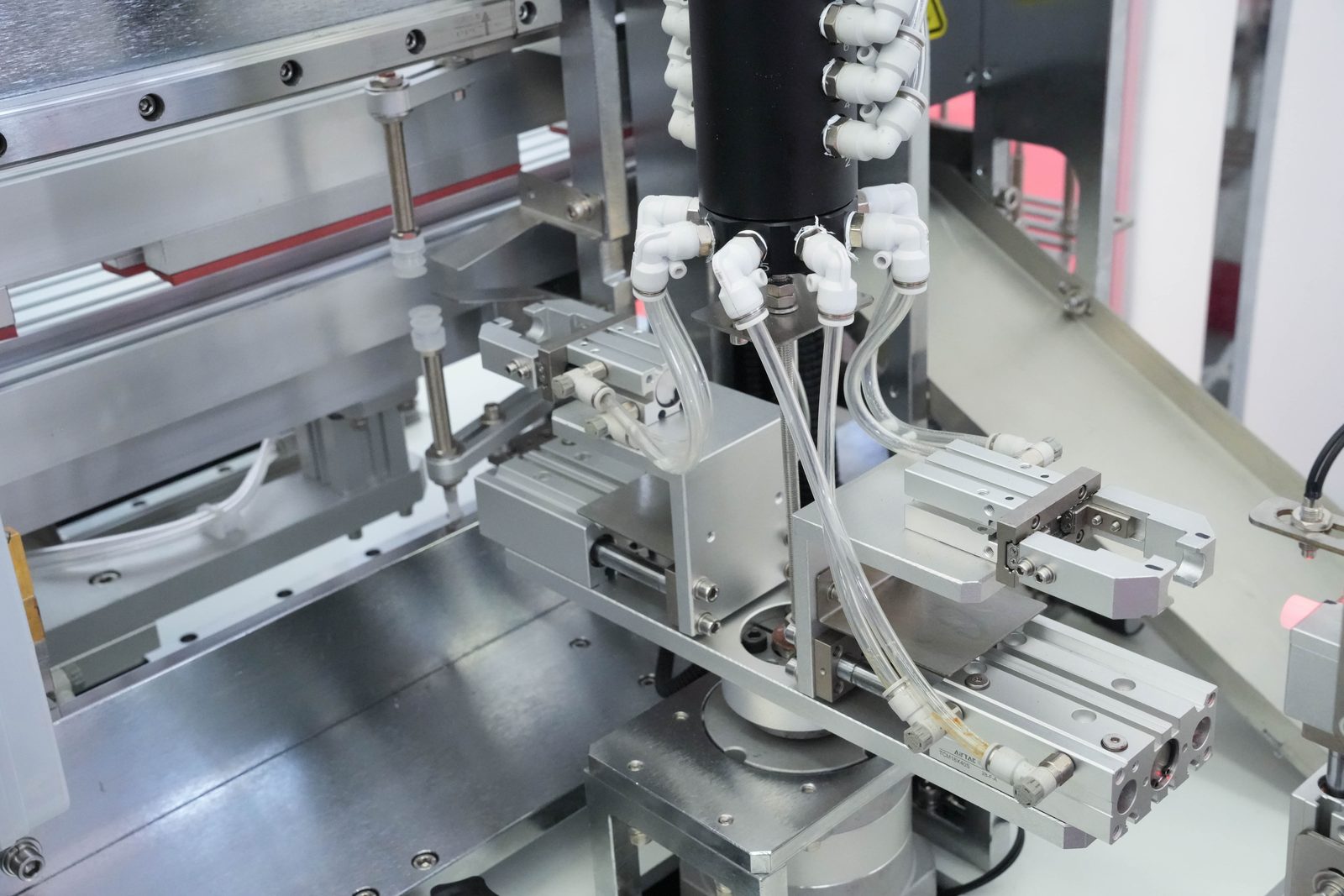 Rotary indexing station and pneumatic layout